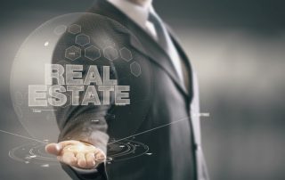 Real Estate Businessman Holding in Hand New technologies