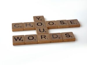 Scrabble-type tiles saying 'choose your words'