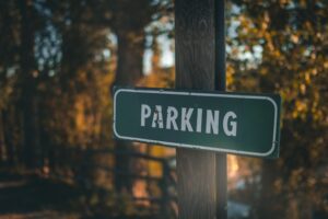 Street scene with green parking sign