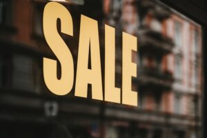 Large 'Sale' sign in shop window