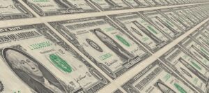 Printing press roll of US dollar bills for article about domain name escrow services