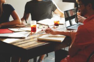 group brainstorming session denoting 'thinking time' when coming up with a business name